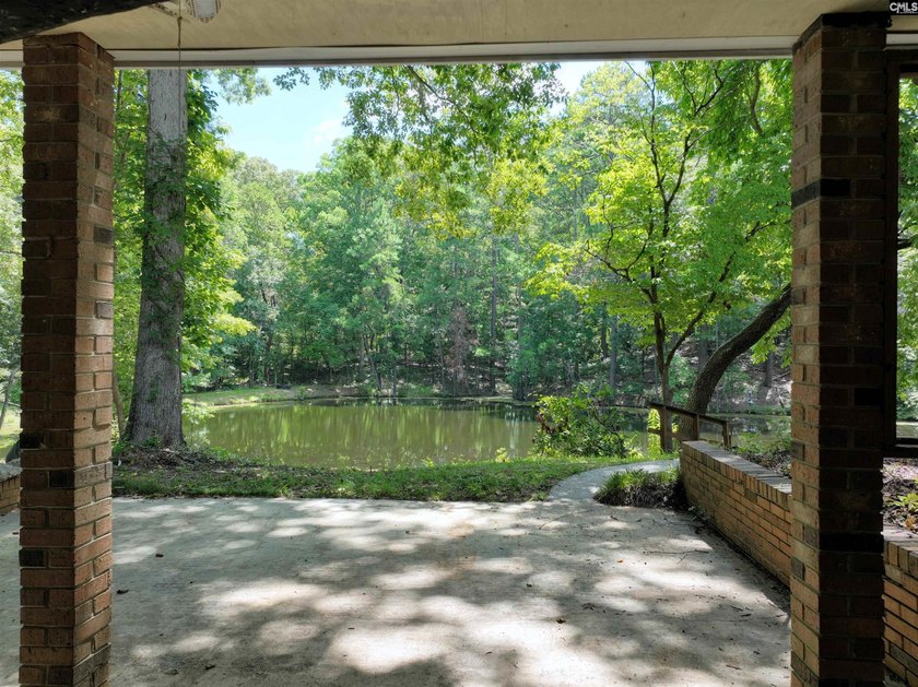 Tucked away on 3.84 sprawling acres with its own private - photo 49