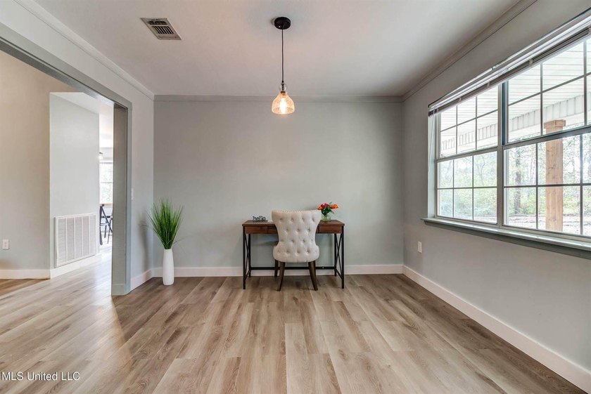 Situated on 1.5 acres in the peaceful Gulfport countryside, this - photo 7