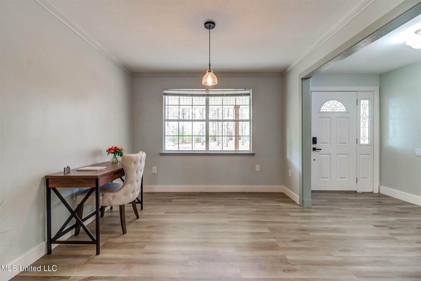 Situated on 1.5 acres in the peaceful Gulfport countryside, this - photo 8