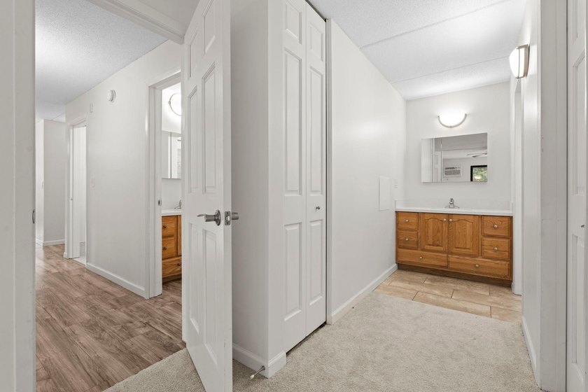 Rare opportunity to own a stunning 4th-floor corner unit in the - photo 13