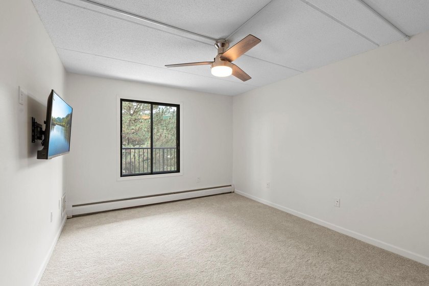 Rare opportunity to own a stunning 4th-floor corner unit in the - photo 18