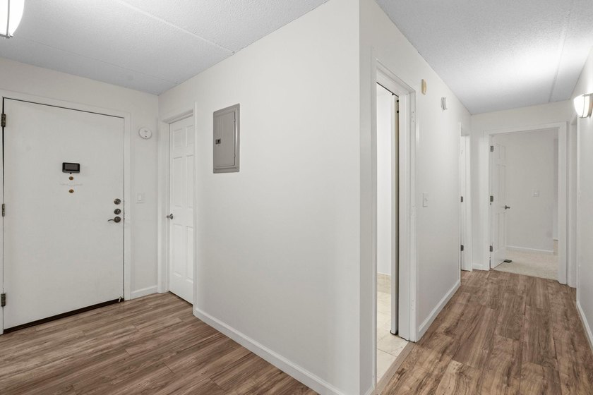 Rare opportunity to own a stunning 4th-floor corner unit in the - photo 21