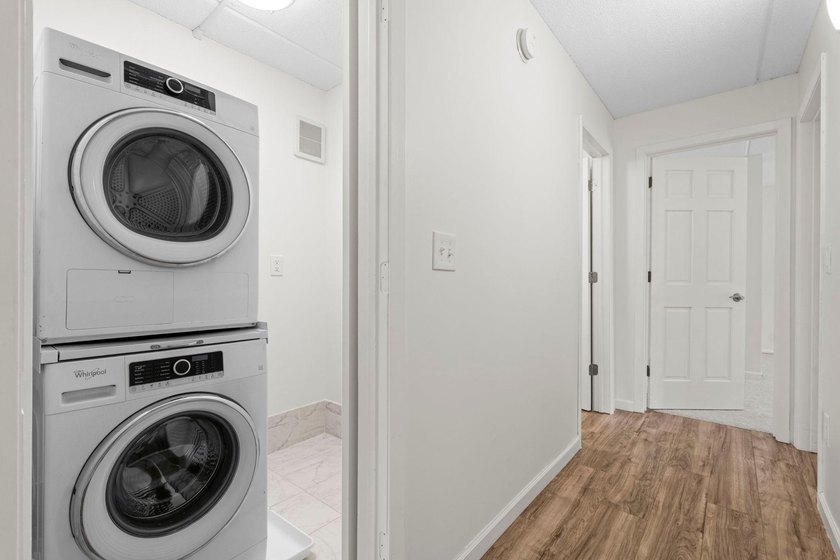 Rare opportunity to own a stunning 4th-floor corner unit in the - photo 23