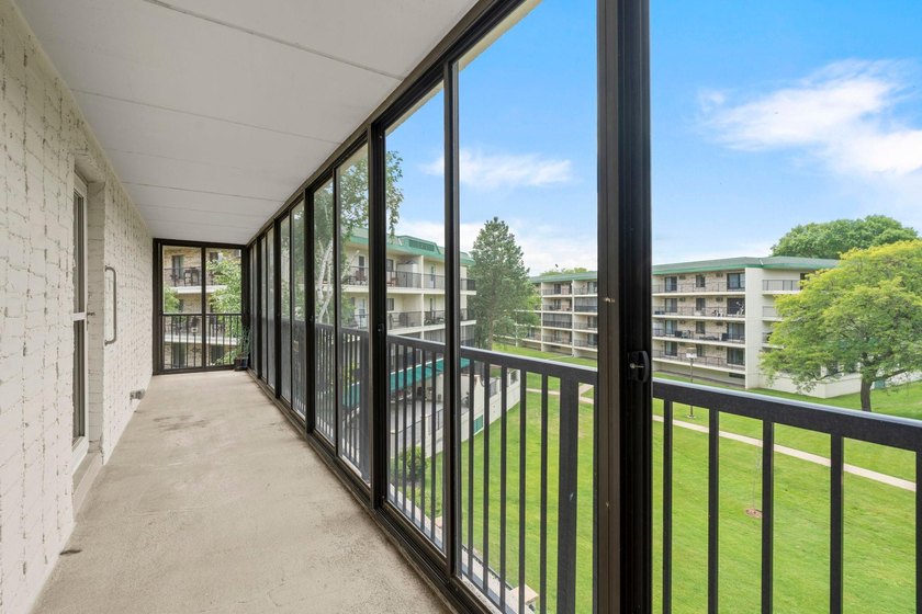 Rare opportunity to own a stunning 4th-floor corner unit in the - photo 24