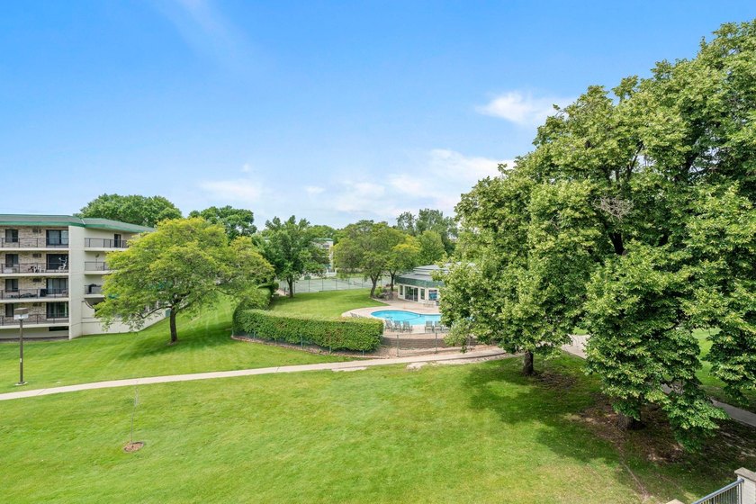 Rare opportunity to own a stunning 4th-floor corner unit in the - photo 26