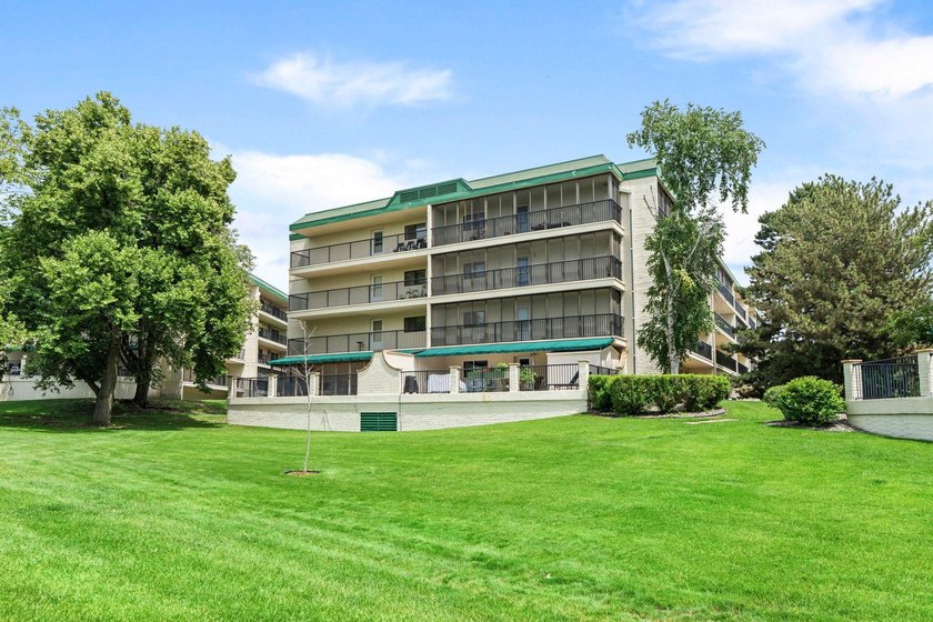 Rare opportunity to own a stunning 4th-floor corner unit in the - photo 30