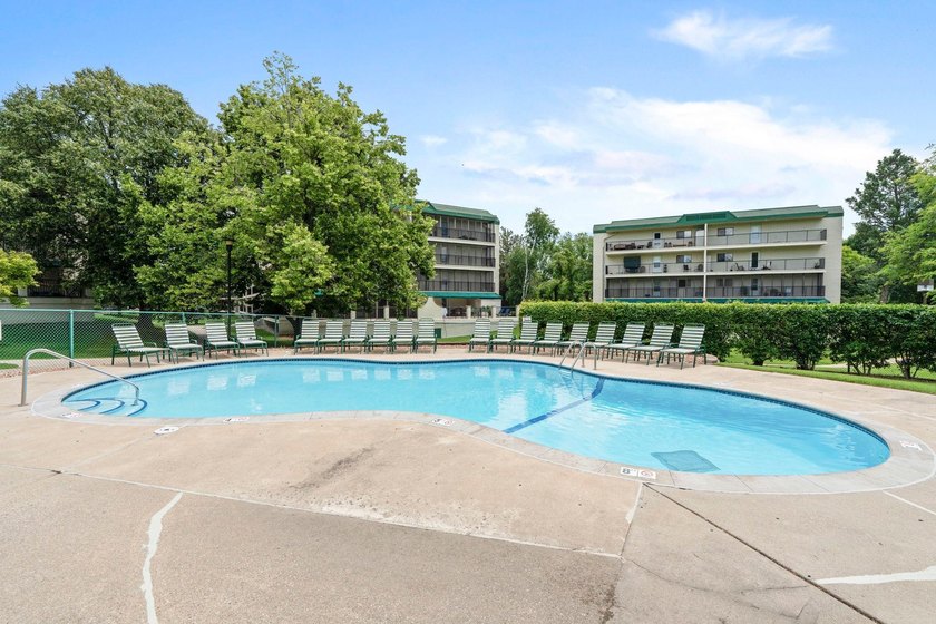 Rare opportunity to own a stunning 4th-floor corner unit in the - photo 31