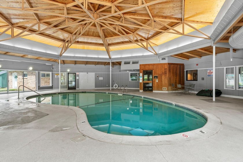 Rare opportunity to own a stunning 4th-floor corner unit in the - photo 32