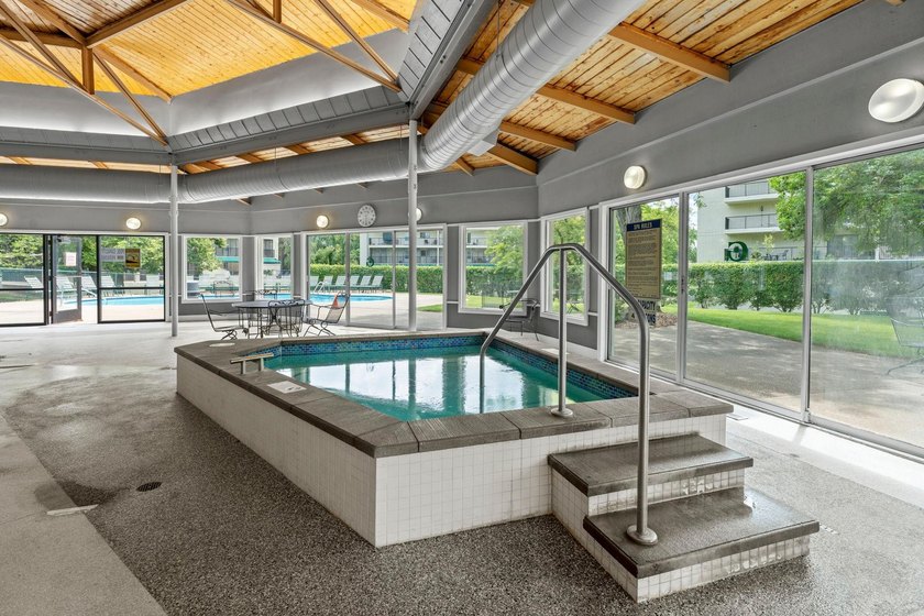 Rare opportunity to own a stunning 4th-floor corner unit in the - photo 34