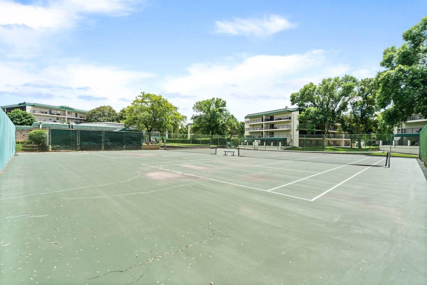 Rare opportunity to own a stunning 4th-floor corner unit in the - photo 36