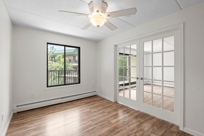 Rare opportunity to own a stunning 4th-floor corner unit in the - photo 48