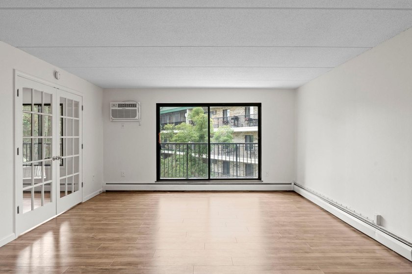 Rare opportunity to own a stunning 4th-floor corner unit in the - photo 49