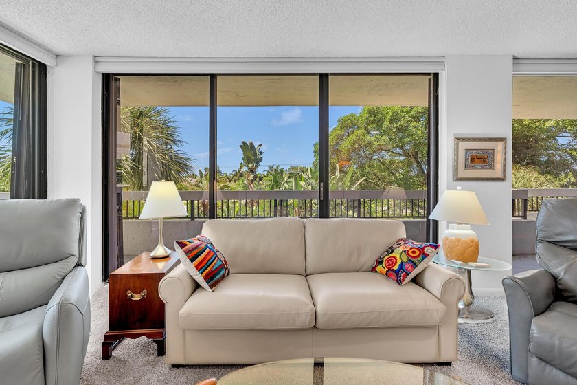Gorgeous corner 3/2 with wraparound balcony facing southeast for - photo 11