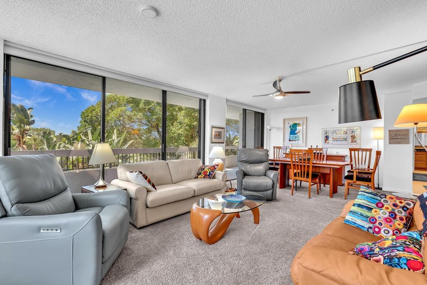 Gorgeous corner 3/2 with wraparound balcony facing southeast for - photo 12