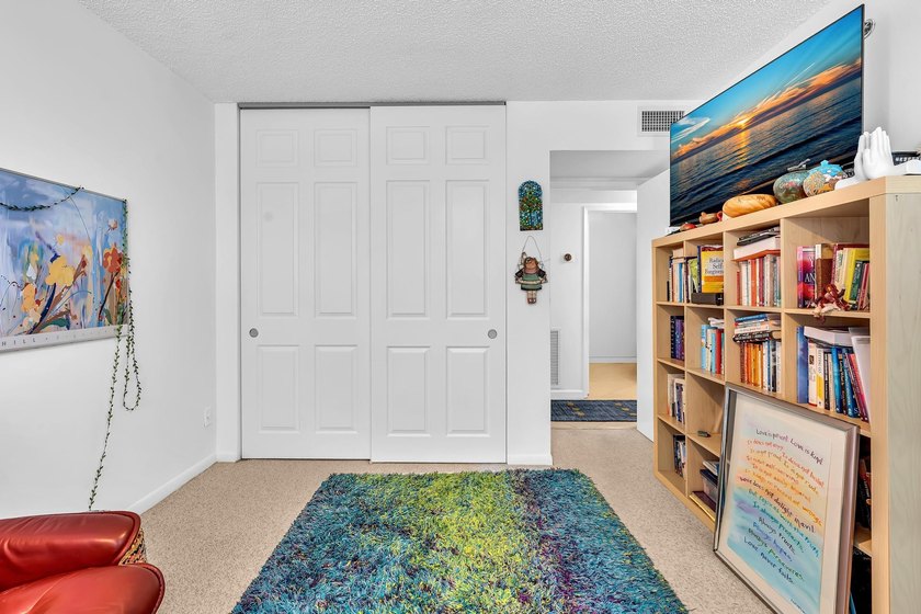 Gorgeous corner 3/2 with wraparound balcony facing southeast for - photo 32