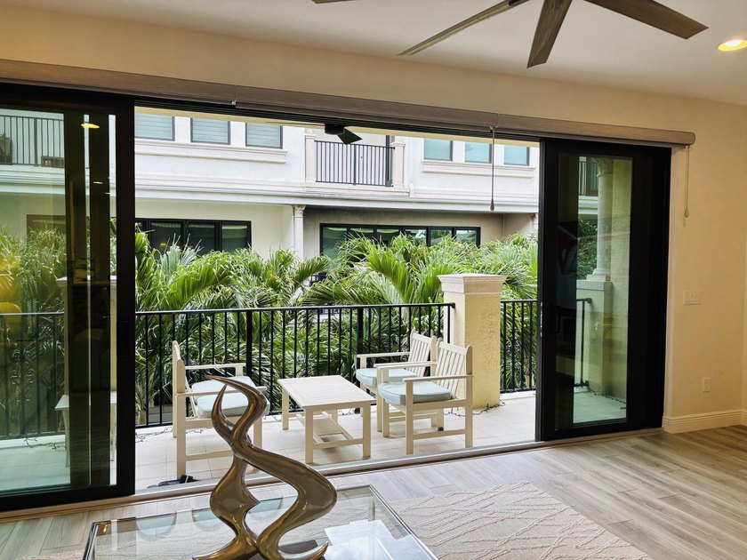 Welcome to this stunning tri-level Mediterranean-style townhome - photo 11