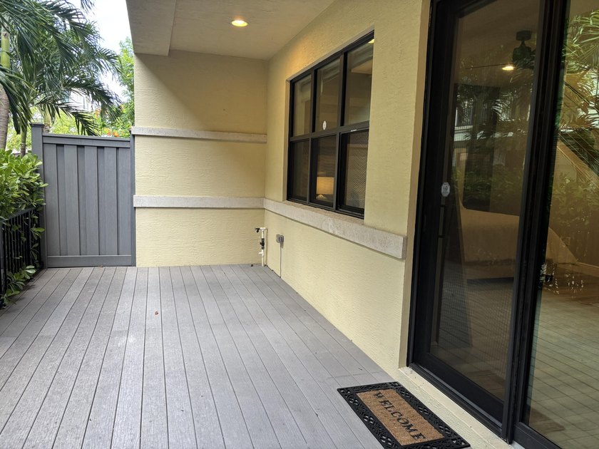 Welcome to this stunning tri-level Mediterranean-style townhome - photo 22