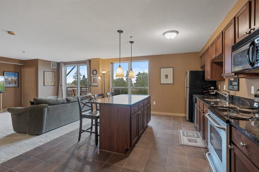 Maintenance free living at its finest in this well cared for - photo 4