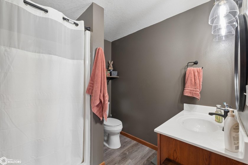 Welcome home to this beautifully updated 3-bedroom, 3-bath twin - photo 15