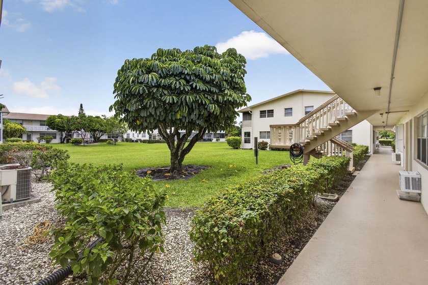 Rare first-floor corner end unit offering extra privacy - photo 47