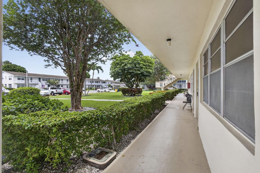 Rare first-floor corner end unit offering extra privacy - photo 48