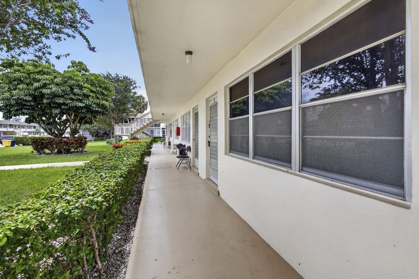 Rare first-floor corner end unit offering extra privacy - photo 49