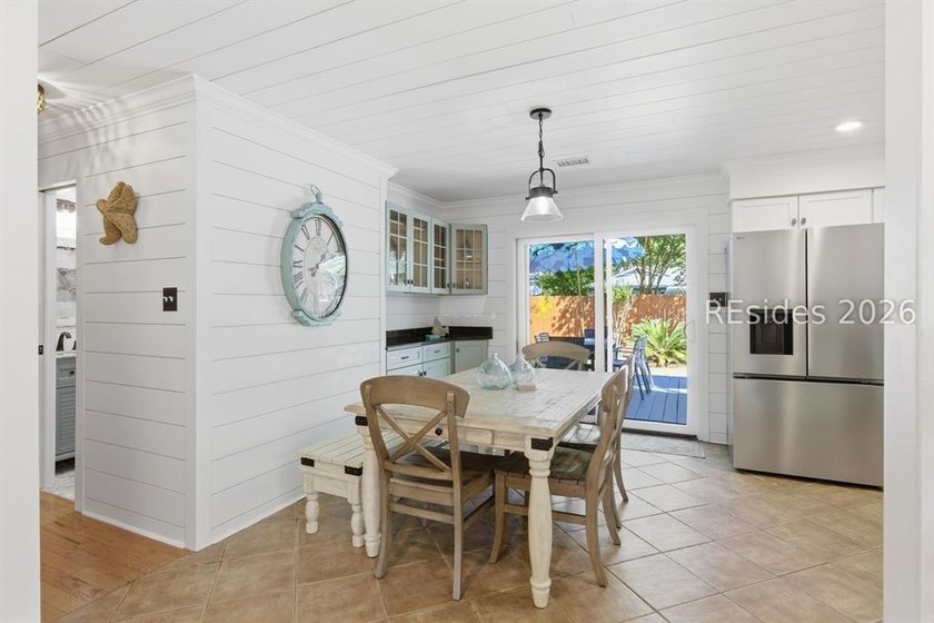 Nestled just steps from the ocean, this charming beach cottage - photo 11