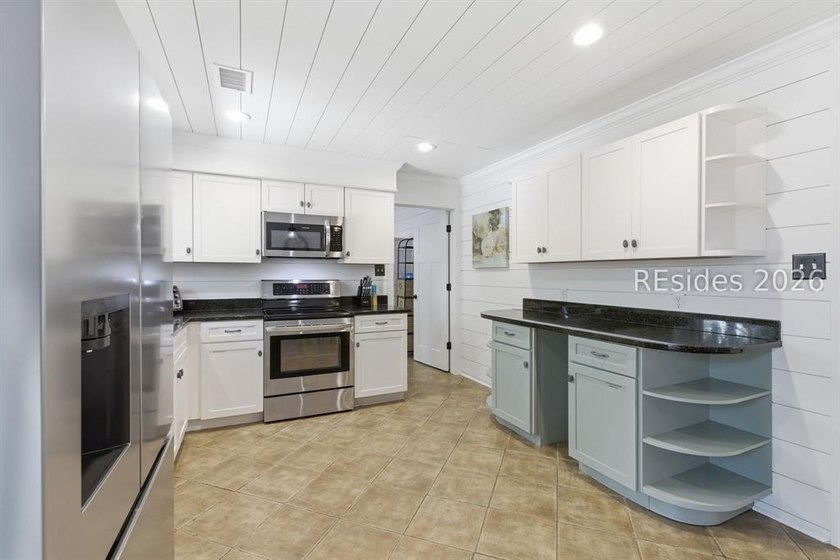 Nestled just steps from the ocean, this charming beach cottage - photo 13
