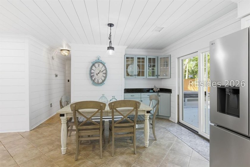 Nestled just steps from the ocean, this charming beach cottage - photo 14