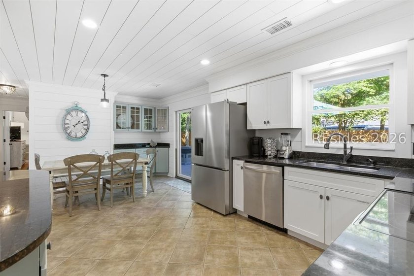 Nestled just steps from the ocean, this charming beach cottage - photo 15