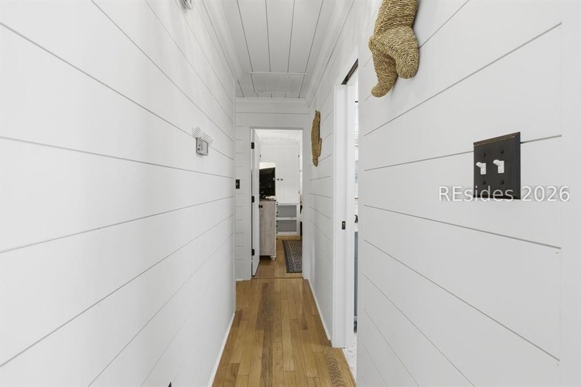 Nestled just steps from the ocean, this charming beach cottage - photo 18