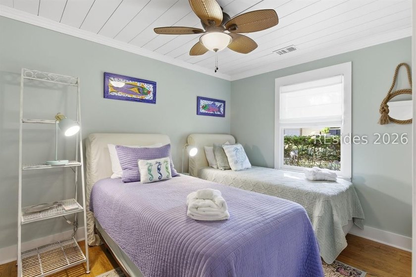 Nestled just steps from the ocean, this charming beach cottage - photo 23