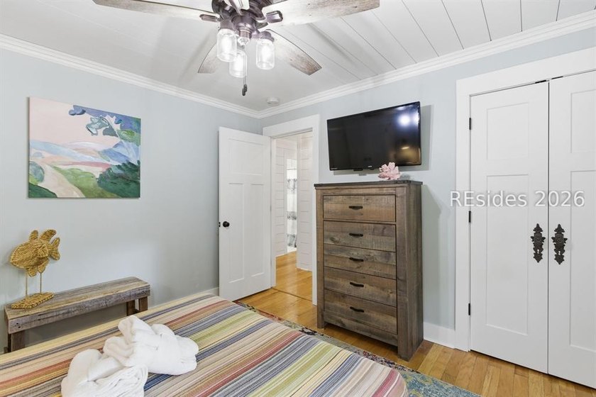 Nestled just steps from the ocean, this charming beach cottage - photo 28