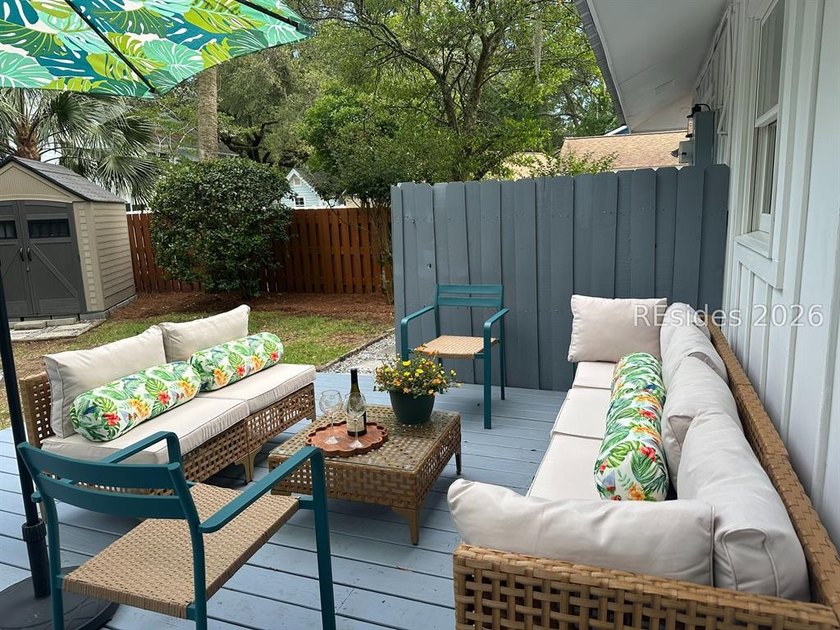 Nestled just steps from the ocean, this charming beach cottage - photo 29