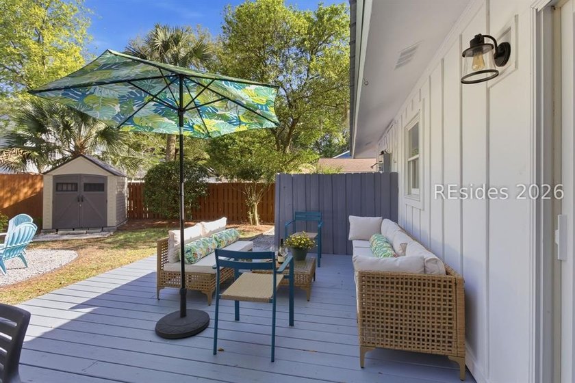 Nestled just steps from the ocean, this charming beach cottage - photo 30