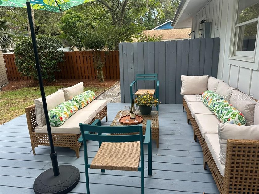 Nestled just steps from the ocean, this charming beach cottage - photo 31