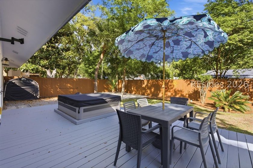 Nestled just steps from the ocean, this charming beach cottage - photo 33