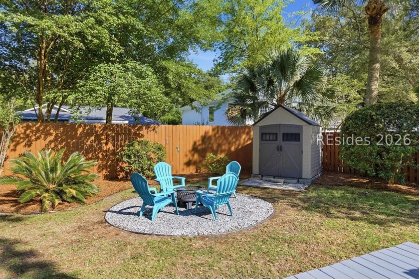 Nestled just steps from the ocean, this charming beach cottage - photo 34