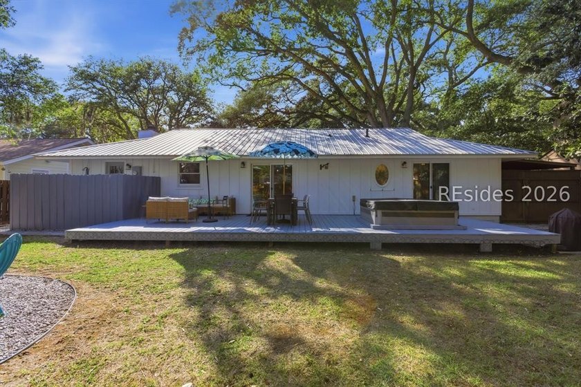Nestled just steps from the ocean, this charming beach cottage - photo 35