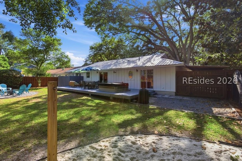 Nestled just steps from the ocean, this charming beach cottage - photo 36