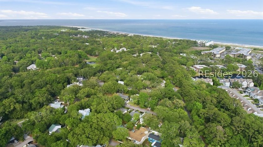 Nestled just steps from the ocean, this charming beach cottage - photo 46