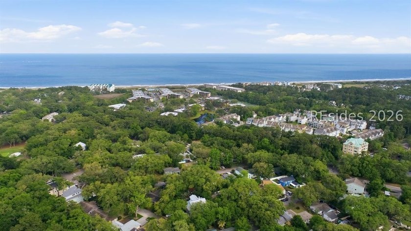 Nestled just steps from the ocean, this charming beach cottage - photo 48