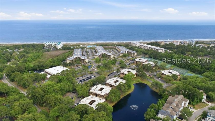 Nestled just steps from the ocean, this charming beach cottage - photo 49
