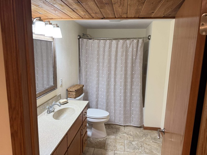 Welcome home to this conveniently updated Ranch situated on a - photo 13