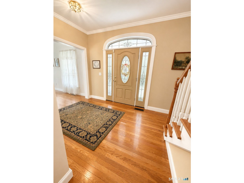 Situated on over an acre of manicured grounds, this custom-built - photo 5