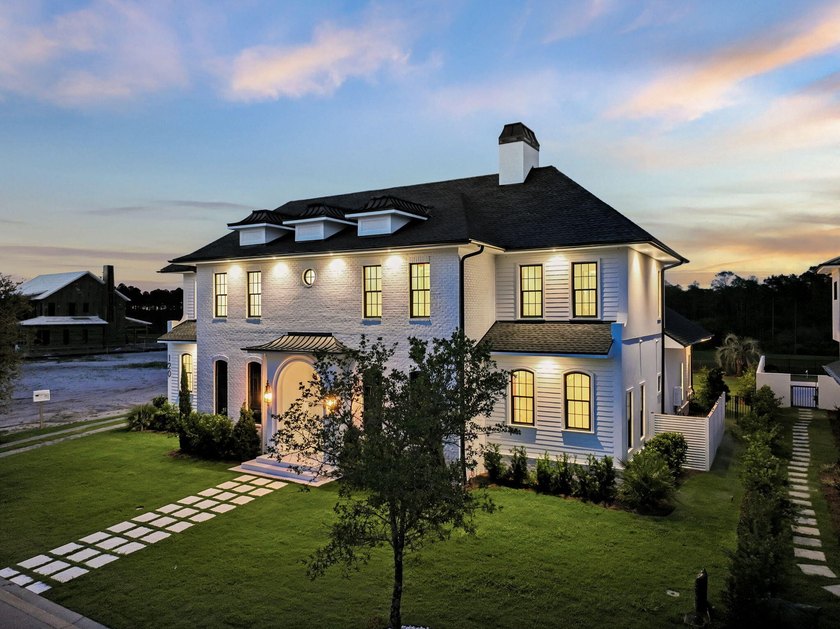 Discover refined coastal living in this stunning custom-designed - photo 3