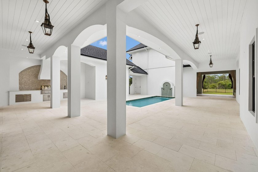Discover refined coastal living in this stunning custom-designed - photo 5