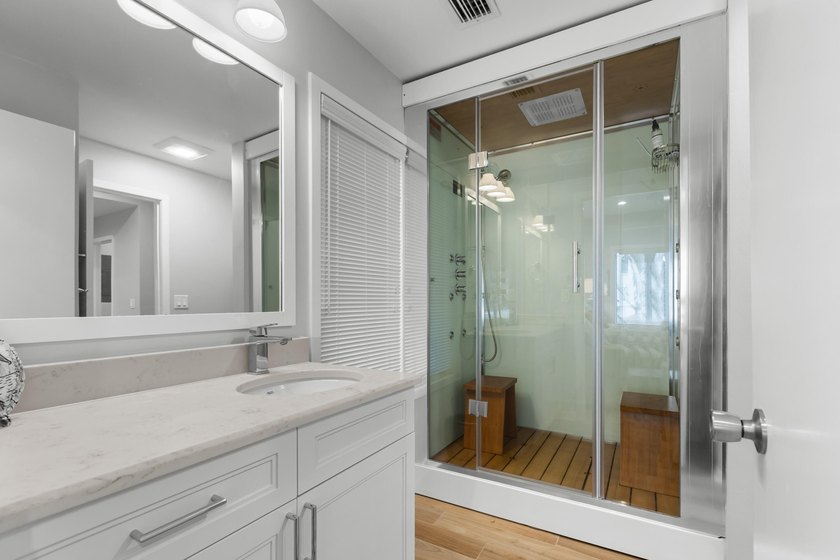 This beautifully updated coastal condo offers the perfect blend - photo 35