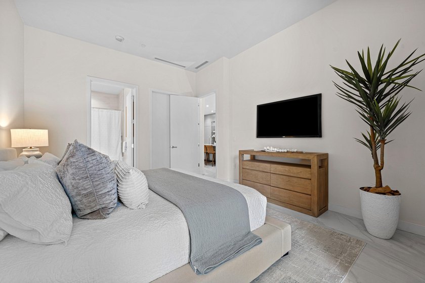 Discover the pinnacle of luxury living in the heart of downtown - photo 13