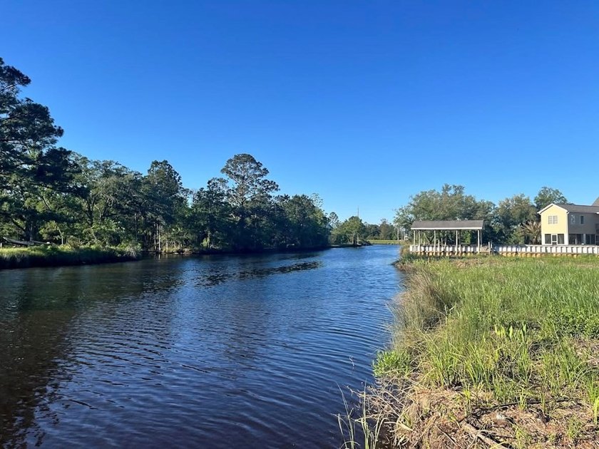 Gorgeous waterfront lot in Bay St. Louis just waiting for your - photo 2